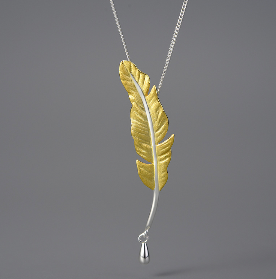 Elegant Golden Goose Feather & Silver Ink Drop Pendant