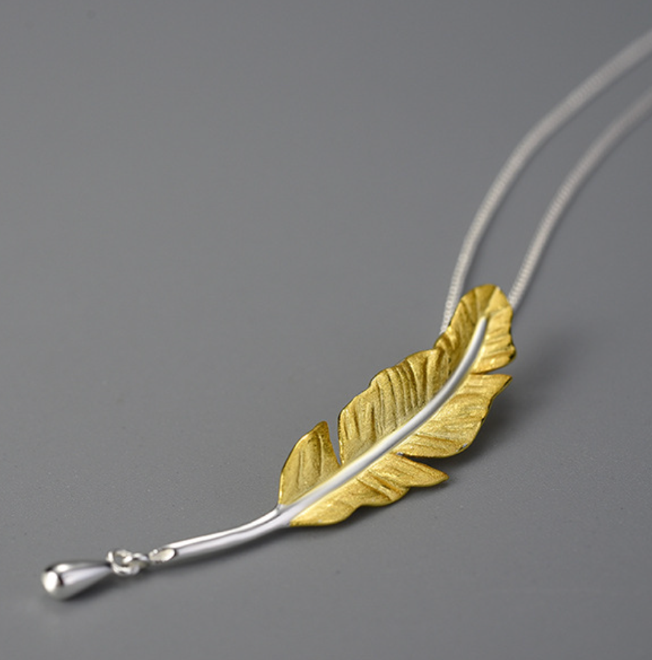 Elegant Golden Goose Feather & Silver Ink Drop Pendant