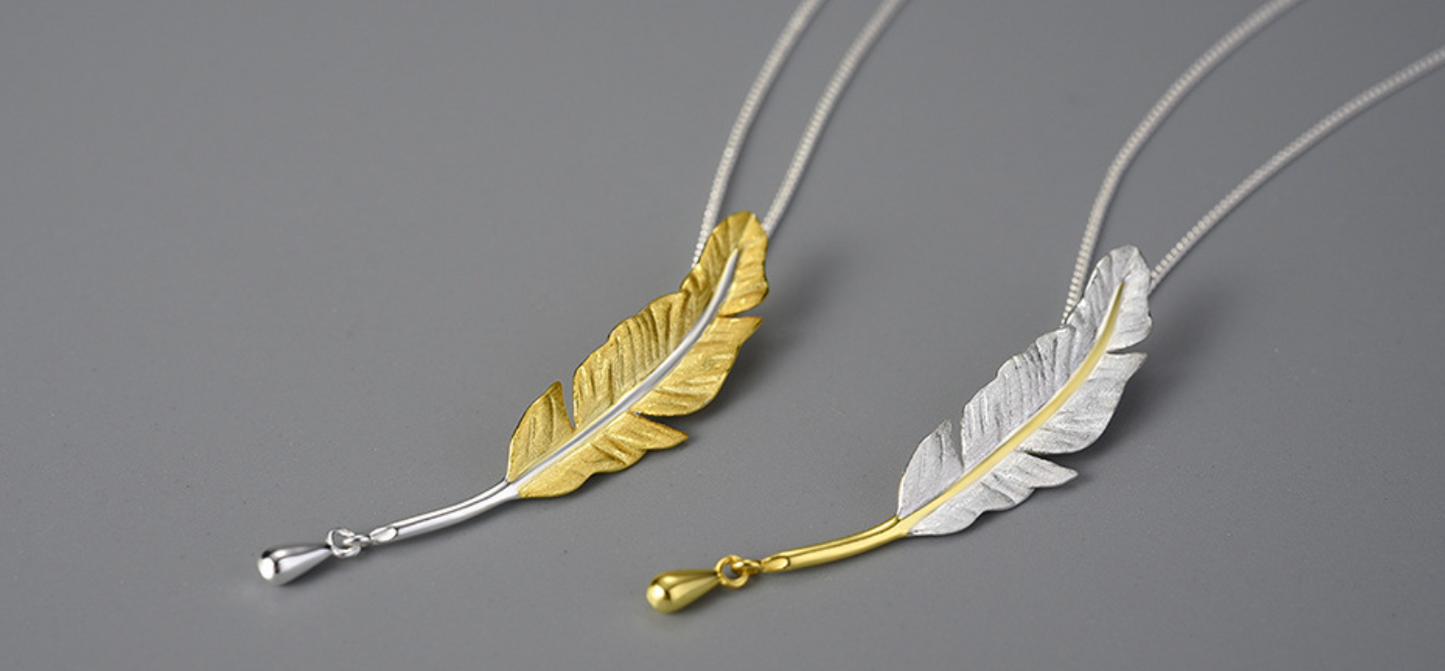 Elegant Golden Goose Feather & Silver Ink Drop Pendant